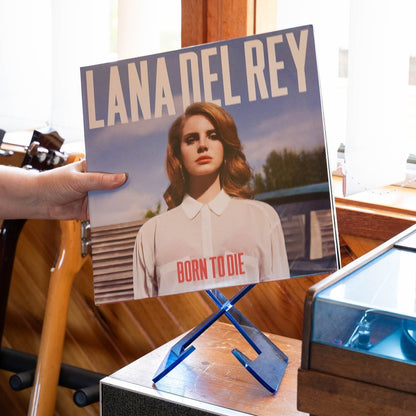 Blue vinyl record stand displaying an LP record, Dubird Melbourne
